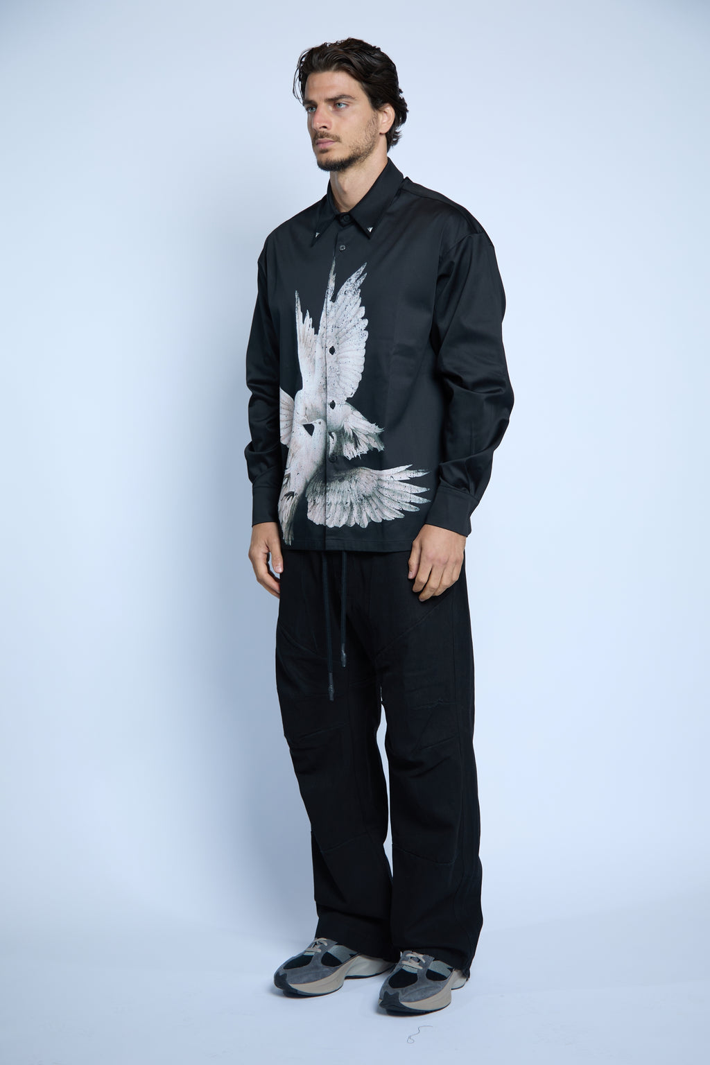 BLACK SHIRT I LEFT TO BECOME DOVE