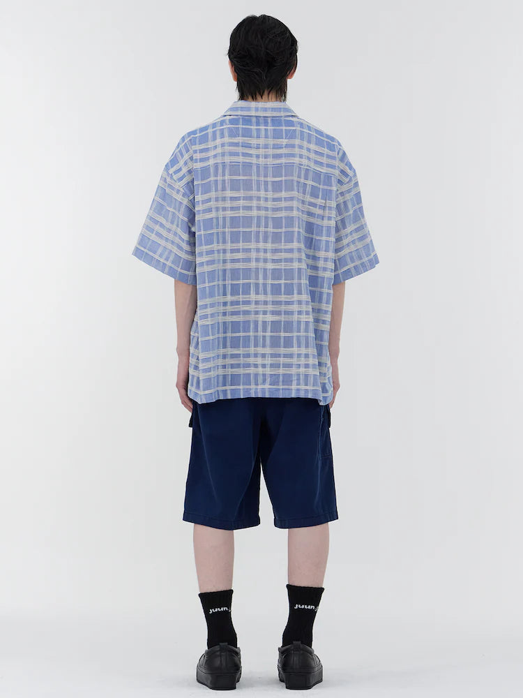 CAMISA DE MANGA CORTA DE CUELLO ABIERTO DE CUADROS SLUBBE AZUL