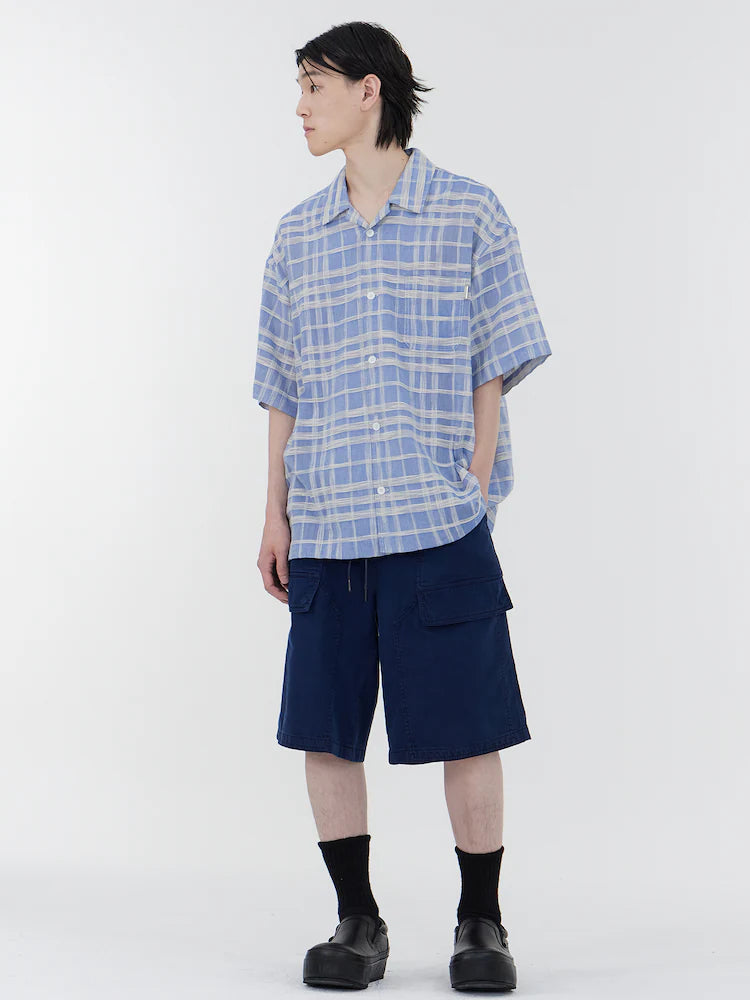 CAMISA DE MANGA CORTA DE CUELLO ABIERTO DE CUADROS SLUBBE AZUL