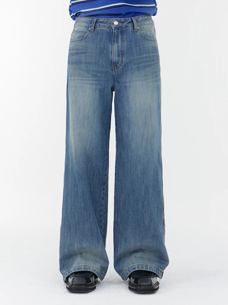 PANTALONES VAQUEROS AZULES CON CREMALLERA DETALLADA Y RIBETE LATERAL RECTO