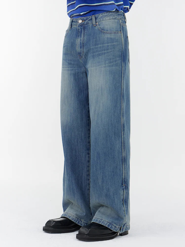 PANTALONES VAQUEROS AZULES CON CREMALLERA DETALLADA Y RIBETE LATERAL RECTO