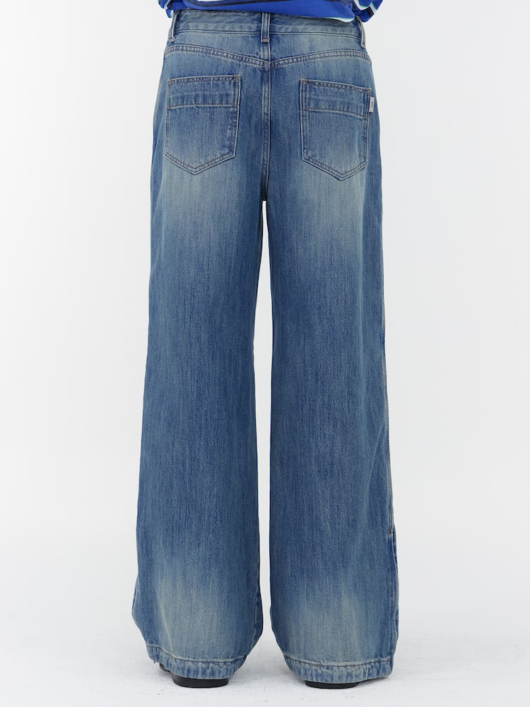 PANTALONES VAQUEROS AZULES CON CREMALLERA DETALLADA Y RIBETE LATERAL RECTO