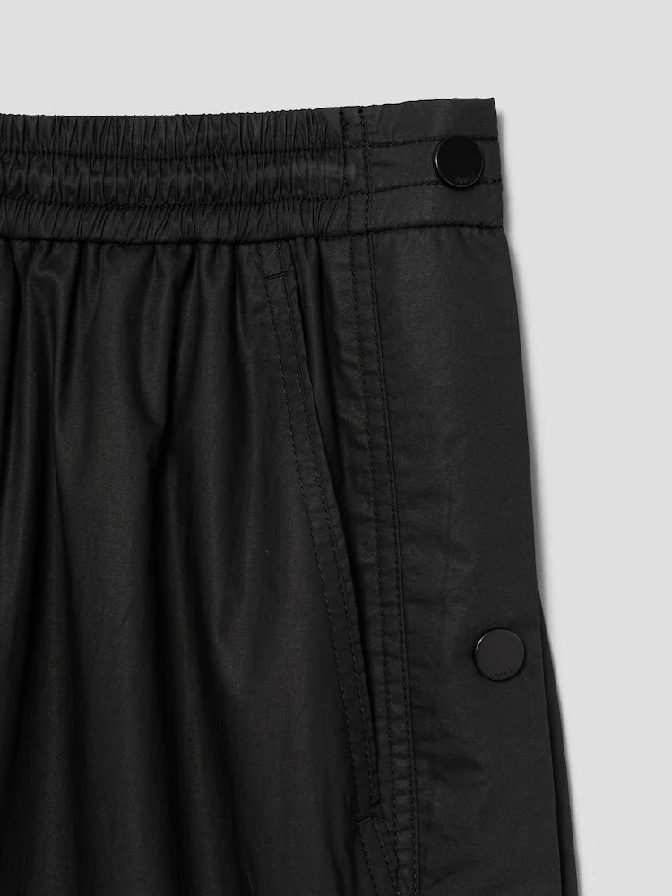 PANTALONES ANCHOS DE ALGODÓN CON BOTONES A PRESIÓN LATERALES Y CÁLIDOS NEGROS