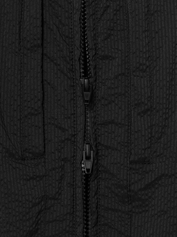 CHALECO DE SEERSUCKER RAYADO NEGRO