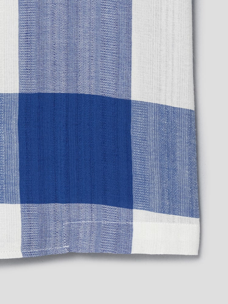 CAMISA DE MANGA CORTA CON CUELLO ABIERTO A CUADROS GRANDES AZULES