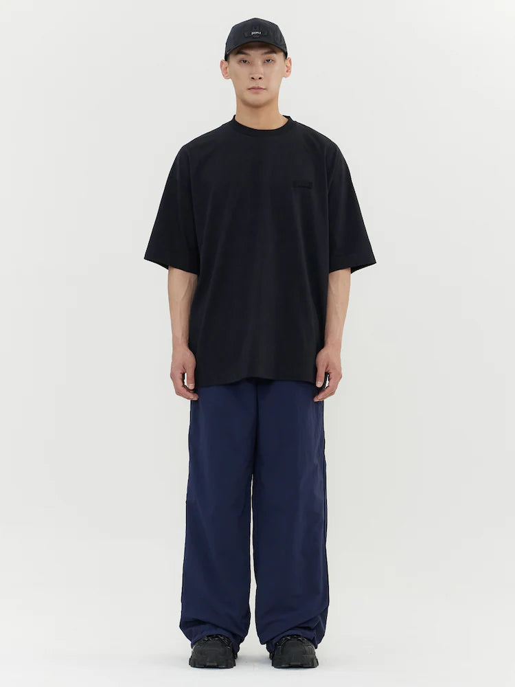 ARCHIVO ESENCIAL DE JUUN.J CAMISETA MANGA CORTA SEMIOVER FIT NEGRA