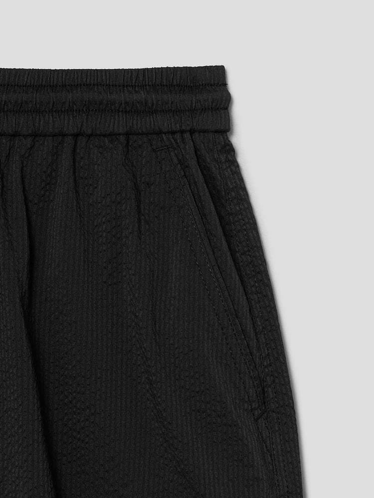 PANTALONES CORTOS CARGO DE SEERSUCKER DE RAYAS ANCHAS NEGRO