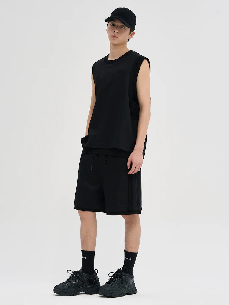 NEGRO REVERSIBLE SIN MANGAS