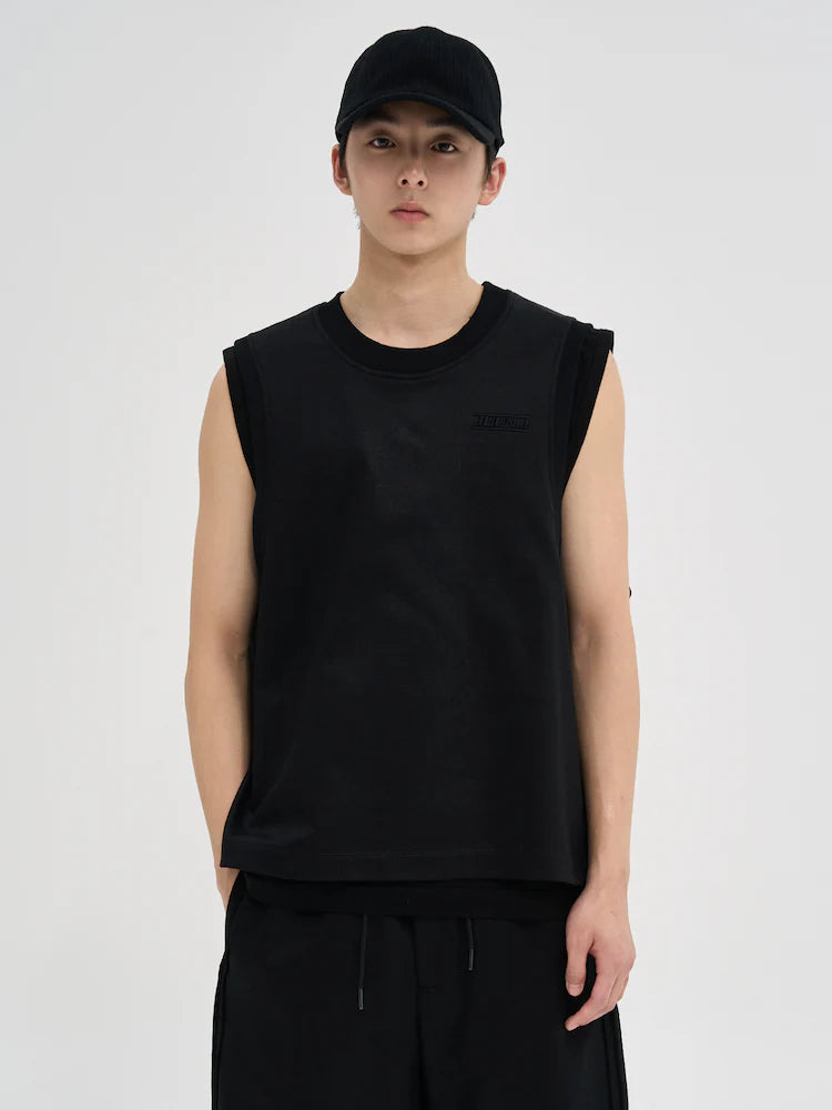 NEGRO REVERSIBLE SIN MANGAS