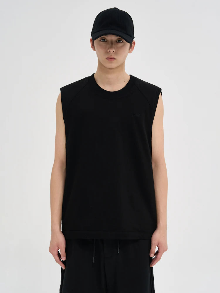NEGRO REVERSIBLE SIN MANGAS