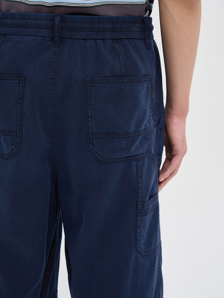 COMFORT LIGHT DENIM CARPENTER SHORTS BLUE