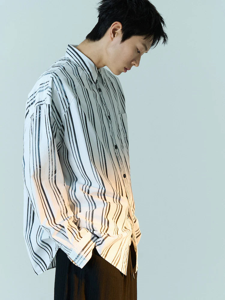 CAMISA OVERSIZE DE RAYAS BLANCAS Y NEGRAS LAVADAS