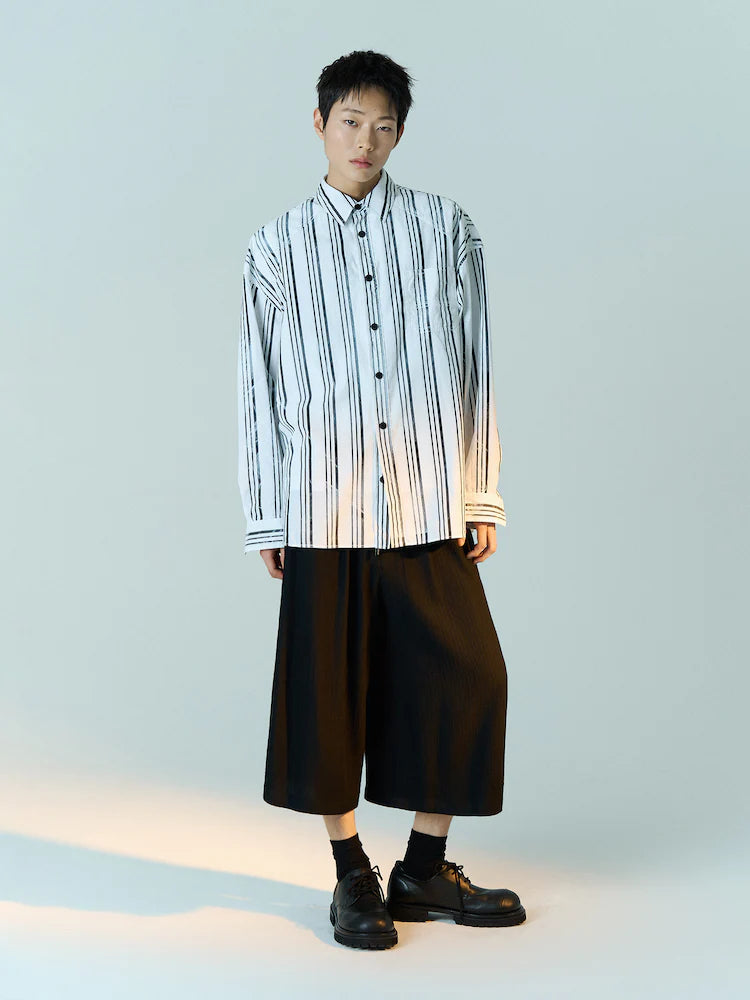 CAMISA OVERSIZE DE RAYAS BLANCAS Y NEGRAS LAVADAS