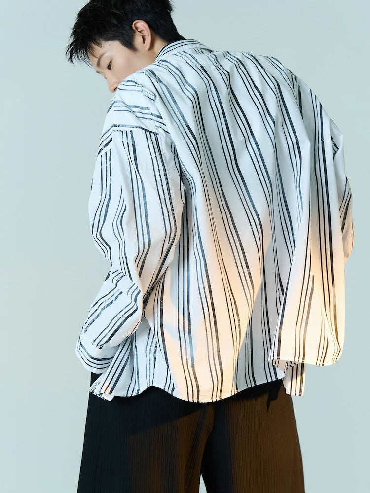 CAMISA OVERSIZE DE RAYAS BLANCAS Y NEGRAS LAVADAS