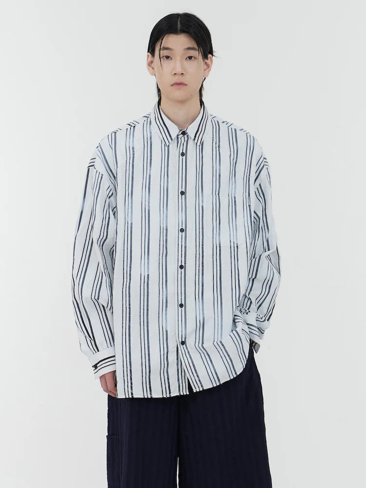 CAMISA OVERSIZE DE RAYAS BLANCAS Y NEGRAS LAVADAS