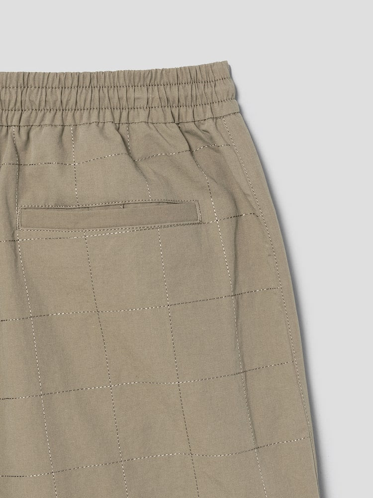 PANTALONES CORTOS DE LINO BEIGE CON COSTURAS ANCHAS