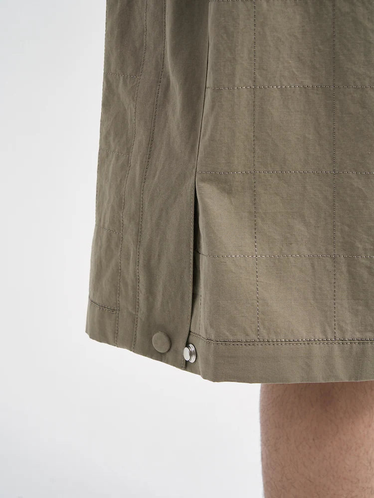 PANTALONES CORTOS DE LINO BEIGE CON COSTURAS ANCHAS