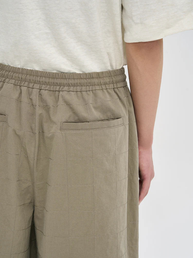 PANTALONES CORTOS DE LINO BEIGE CON COSTURAS ANCHAS