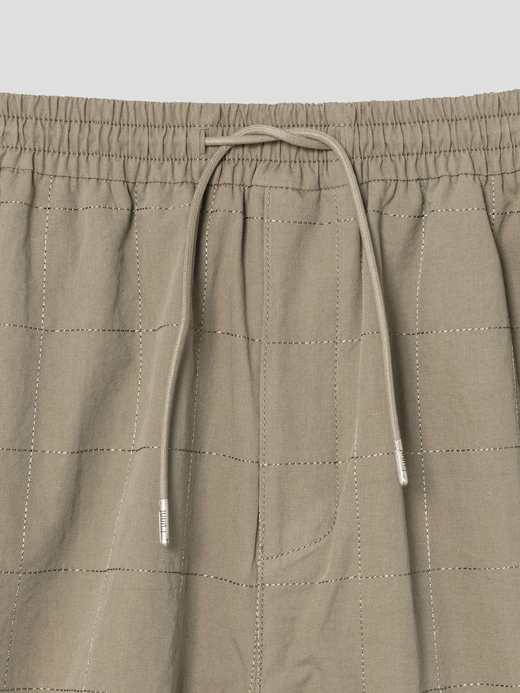 PANTALONES CORTOS DE LINO BEIGE CON COSTURAS ANCHAS